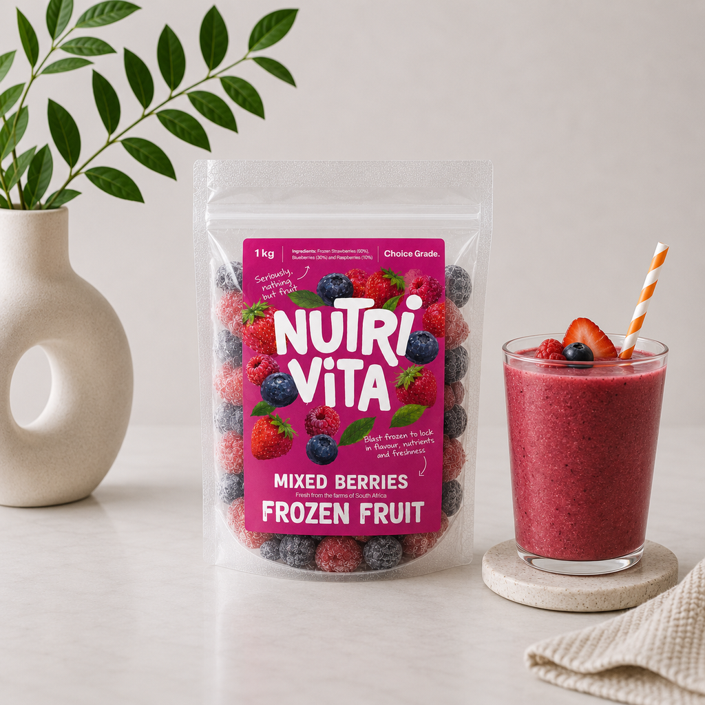 Nutri Vita mixed berries frozen fruit pouch beside a berry smoothie topped with fresh berries