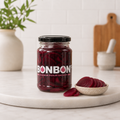 Jar of Bonbon handmade pickled beetroot beside a small bowl of sliced beetroot