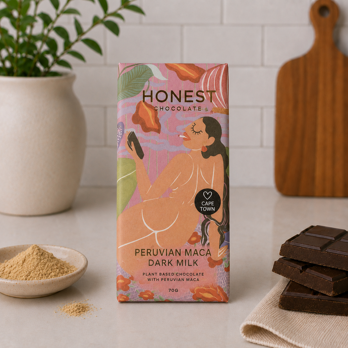 Honest Chocolates Peruvian Maca Dark Mylk chocolate slab with stacked chocolate pieces and maca powder