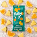 Nutri Vita Tropical-C orange and pineapple cold-pressed juice lolly pouch on ice with citrus and pineapple slices