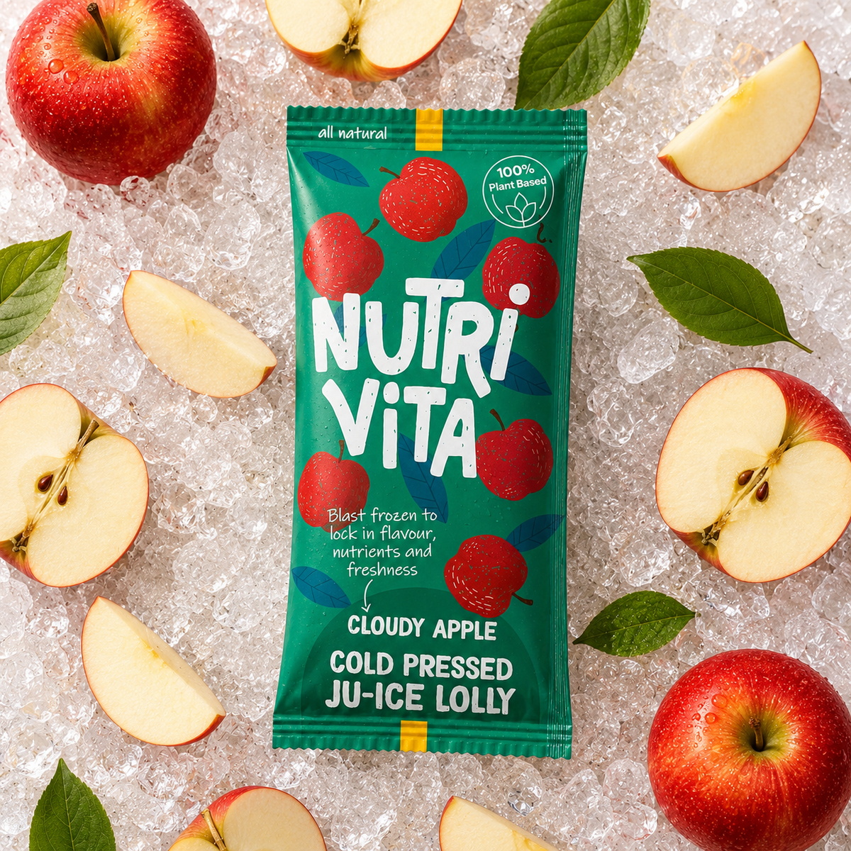 Nutri Vita Cloudy Apple cold pressed juice lolly in a green wrapper on crushed ice with fresh apple slices