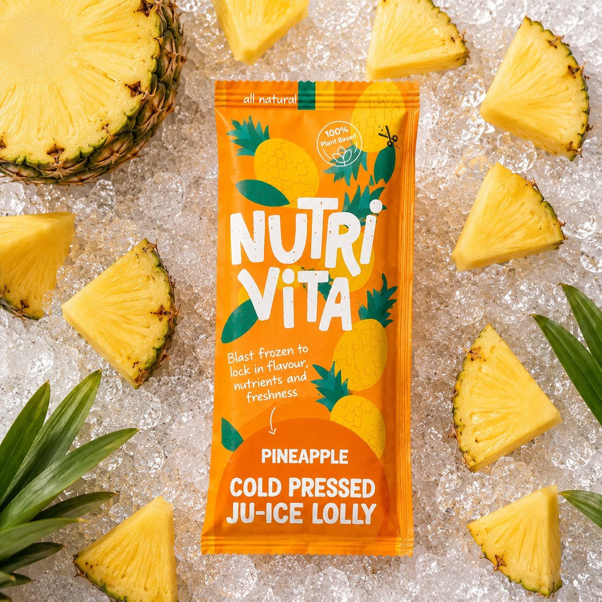 Nutri Vita pineapple cold pressed juice lolly in orange packaging, surrounded by pineapple slices on ice