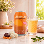 CultureLab kombucha can with lion's mane, reishi and cordyceps beside a glass of amber kombucha