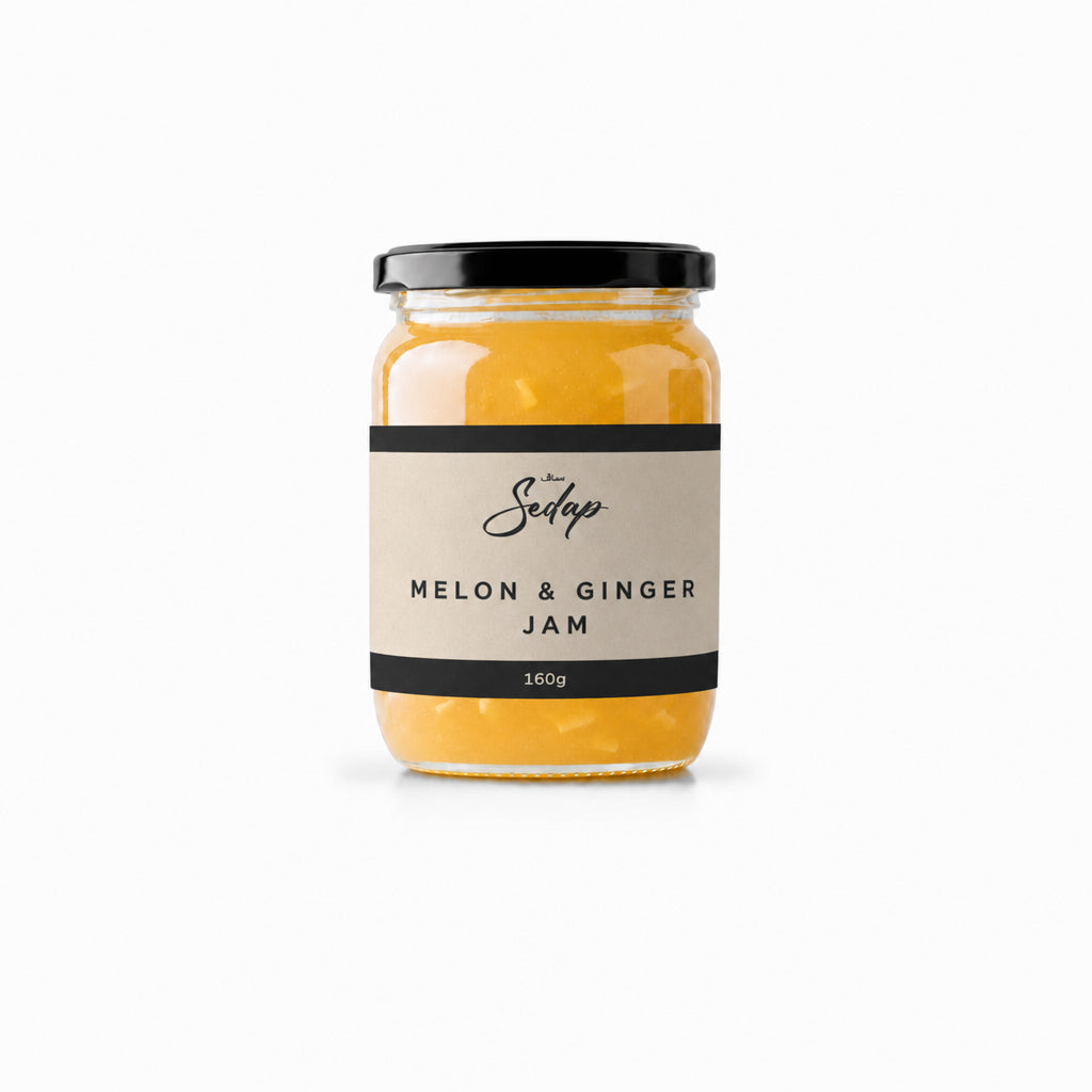 Glass jar of golden melon and ginger jam with a black lid and cream Sedap label