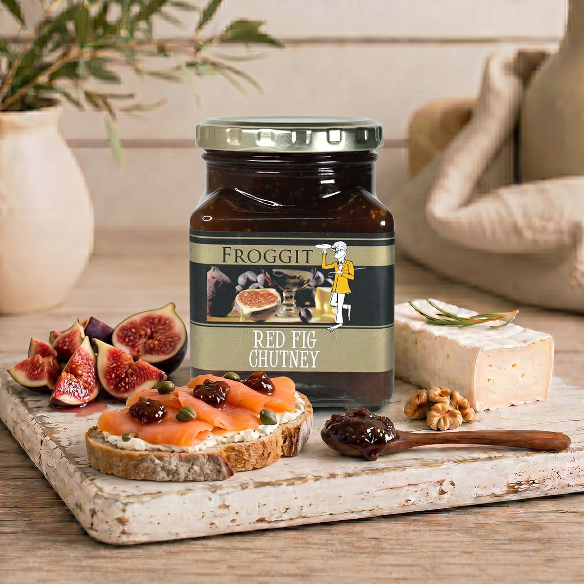 Jar of Froggitt red fig chutney with fresh figs, smoked salmon toast, cheese and walnuts