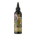Dark squeeze bottle of thyme infused red wine reduction with floral FrogGit label